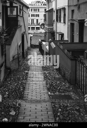 Embracing the beauty of Genoa in the rain through my lens. Every droplet tells a story, every puddle reflects a moment in time. Stock Photo