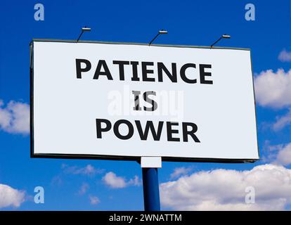 Patience is power symbol. Concept words Patience is power on beautiful big white billboard. Beautiful blue sky cloud background. Business and patience Stock Photo