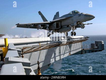 F/A-18E Super Hornet launches off the flight deck USS Nimitz, the Pacific Ocean on Feb. 24, 21. Photo by Elliot Schaudt Stock Photo