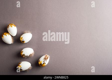 Easter eggs on dark gray background. Easter concept. Top view, flat lay, copy space. Stock Photo