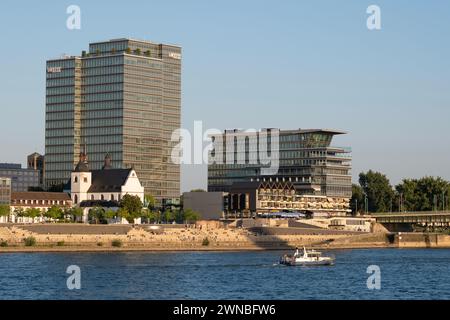 View from across the River Rhine at Cologne, towards the Deutz area with the St. Heribert Orthodox Church standing below the Lanxess building. Stock Photo