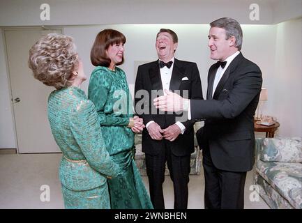 March 17,1985. Quebec City, Canada.  President Reagan and Nancy Reagan laughing during a trip to Quebec City Canada for a Gala Performance with Prime Minister Brian Mulroney and Mila Mulroney at the Grand Theatre de Quebec Stock Photo