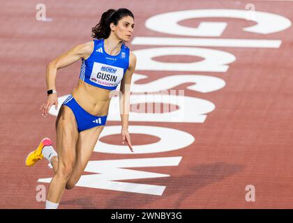 Glasgow, Scotland. 01 March 2024.  7th place finisher Tatiana GUSIN (GRE) makes her run-up in the high jump event   Credit: Raymond Davies / Alamy Live News Stock Photo