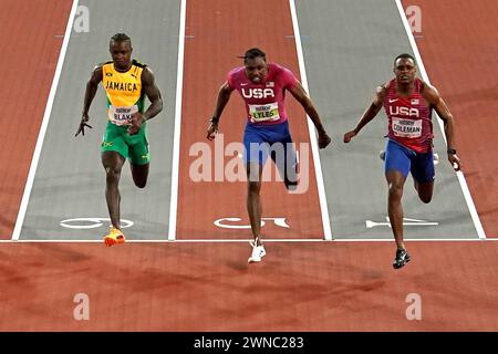 USA's Christian Coleman (right) wins gold in the Men's 60 Metres Final with USA's Noah Lyles (centre) winning silver and Jamaica's Ackeem Blake winning bronze during day one of the World Indoor Athletics Championships at the Emirates Arena, Glasgow. Picture date: Friday March 1, 2024. Stock Photo