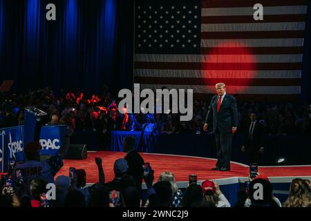 New York, United States. 24th Feb, 2024. Former President Donald Trump greets the audience at the Conservative Political Action Conference National Harbor, Md. Attendees and speakers gather for Conservative Political Action Conference National Harbor, Md. (Photo by Olga Fedorova/SOPA Images/Sipa USA) Credit: Sipa USA/Alamy Live News Stock Photo