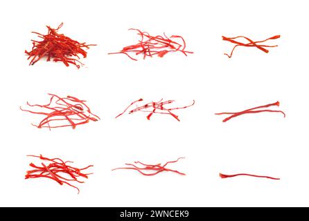 Stigmas of aromatic saffron isolated on white, set Stock Photo