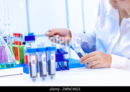 Scientist conducting soil experiment Stock Photo