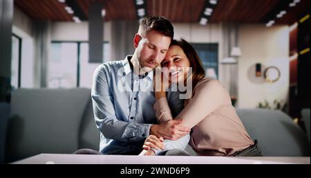 Romantic Happy Couple Relaxing On Couch At Home Stock Photo