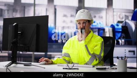 Woman Working In Power Plant Electricity Generation Stock Photo