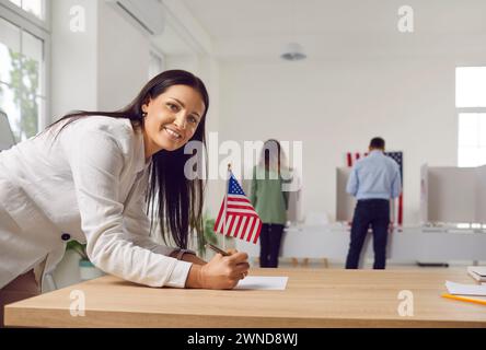 USA Woman Casting Her Vote on Election Day Stock Photo