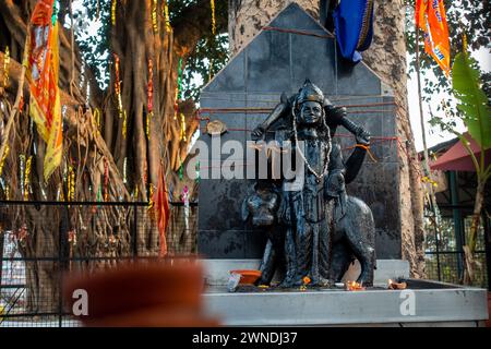 Jan.11th, 2024, Uttarakhand India. Sacred Black Stone Sculpture: Lord Shani and Water Buffalo, Hindu Deity in Uttarakhand, India Stock Photo