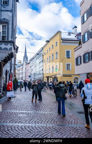 BRUNECK-BRUNICO, ITALY - JANUARY 25, 2024: Street view of a picturesque old town in Bruneck - the largest town in the Pustertal valley in South Tyrol Stock Photo