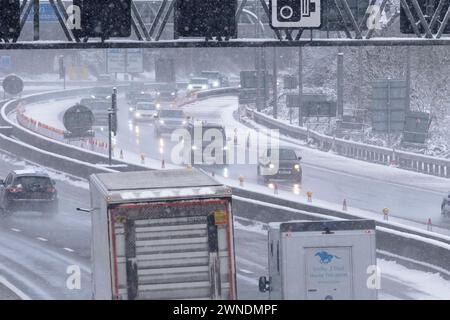 Bristol, UK. 2nd Mar, 2024. Morning snow fall makes tricky driving conditions on the M5 near Bristol. Outside lane is closed. Pictured is the M5 between junctions 15/16 and 17. Credit: JMF News/Alamy Live News Stock Photo
