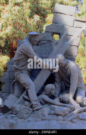 Pietro Kufferle’s sculpture commemorating the help given by Russian sailors who saved victims buried in the aftermath of the1908 Messina earthquake. Stock Photo