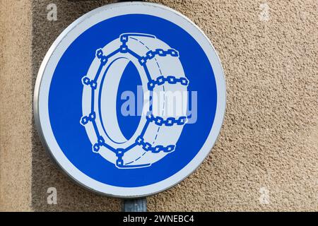 Snow chains road sign in France Stock Photo