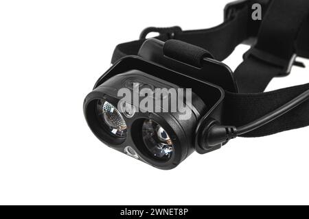 Modern LED headlamp. A flashlight for when you need your hands free. Isolate on a white background. Stock Photo