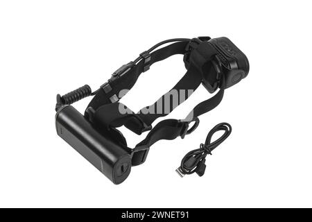 Modern LED headlamp. A flashlight for when you need your hands free. Isolate on a white background. Stock Photo