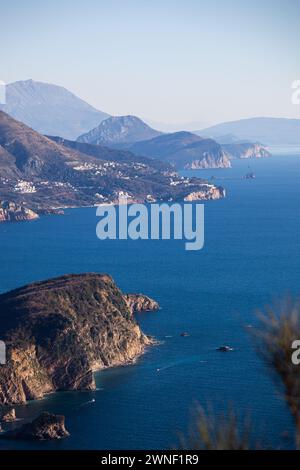 Colorful winter seascape with blue water of the Adriatic Sea and the island of Sveti Nikola near the city of Budva in Montenegro. Stock Photo