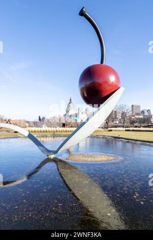 The iconic 'Spoonbridge and Cherry' sculpture rests in the Minneapolis Sculpture Garden. Stock Photo