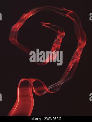 Abstract shaped created using copper wire and intentional camera movement Stock Photo