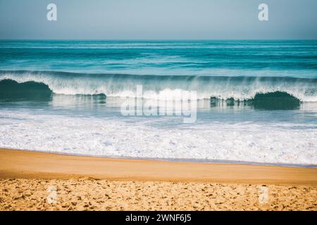 Wave breaking to the beach on  the coast in Brittany, intentionnal grain Stock Photo
