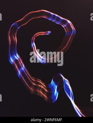 Abstract shaped created using copper wire and intentional camera movement Stock Photo