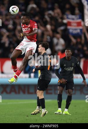 Monaco, Monaco. 1st Mar, 2024. Wilfried Singo of AS Monaco heads clear as Vitinha and Nuno Alexandre Tavares Mendes of PSG look on during the Ligue 1 match at Stade Louis II, Monaco. Picture credit should read: Jonathan Moscrop/Sportimage Credit: Sportimage Ltd/Alamy Live News Stock Photo