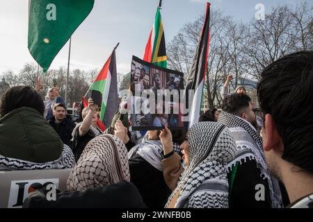Berlin, Germany. 02nd Mar, 2024. March 2, 2024, Berlin, Germany: In Berlin, on March 2, 2024, a protest took place amidst the Israel-Hamas war in Gaza. The rally started at the Neptunbrunnen and involved a large crowd vocalizing a series of slogans. Among the slogans chanted by the protestors were phrases such as ''Free Palestine'' and ''Resistance is justified when Palestine is occupied.'' They also included direct criticisms of global political leaders, with chants like ''Biden, you will see, Palestine will be free, '' pointing to dissatisfaction with international support for Israel. Credit Stock Photo