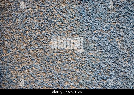 Faded blue weathered old house plastered wall closeup as grunge background Stock Photo