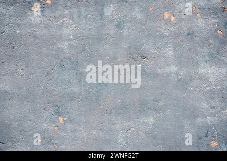 Faded blue weathered old house plastered wall closeup as grunge background Stock Photo