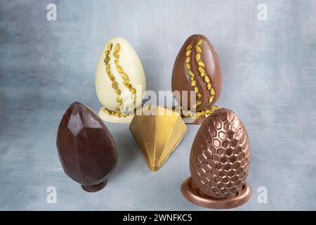 Assorted Easter eggs with pistachios, milk and dark chocolate 1. Stock Photo