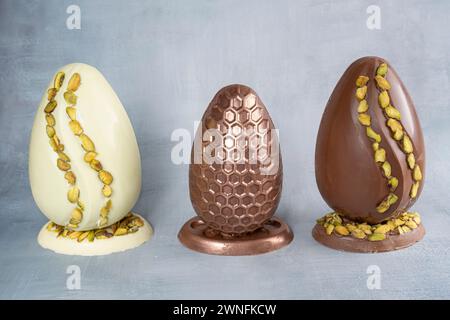 Assorted Easter eggs with pistachios, milk and dark chocolate 3. Stock Photo
