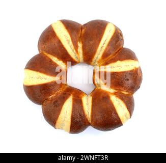 Freshly baked traditional German laugenbrot. Bavarian homemade pretzel rolls lye bread, close-up, isolated on white background. Stock Photo