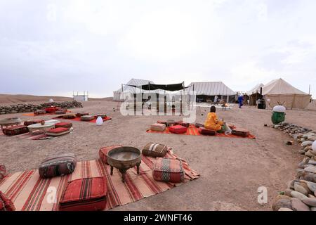 Marrakesh, Morocco - may 31, 2019- A panoramic view of a glamping site at sunset in the Agafay Desert, near Marrakesh in Morocco Stock Photo