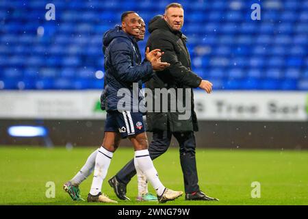 Victor Adeboyejo #14 of Bolton Wanderers and Bolton Manager Ian Evatt at full time during the Sky Bet League 1 match between Bolton Wanderers and Cambridge United at the Toughsheet Stadium, Bolton on Saturday 2nd March 2024. (Photo: Mike Morese | MI News) Credit: MI News & Sport /Alamy Live News Stock Photo