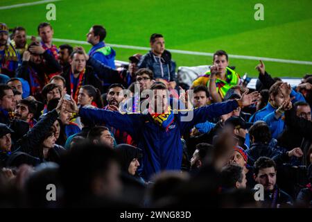 CULERS HARDCORE FANS, BARCELONA FC, 2019: A man leads the passionate Culers fans of Barcelona at Camp Nou to celebrate an easy win over a title rival. Barcelona FC v Sevilla FC at Camp Nou, Barcelona on 5 April 2017. Photo: Rob Watkins. Barca won the game 3-0 with three goals in the first 33 minutes. The game was played in a deluge of rain during a massive storm. Stock Photo