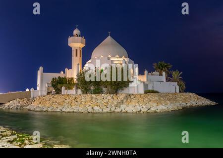 White Salem Bin Laden Mosque built on the island in the twilight surrounded by persian gulf, Al Khobar, Saudi Arabia Stock Photo