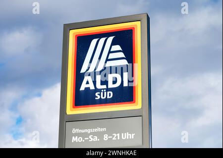Cologne, Germany February 24 2024: advertising sign of an aldi store in cologne ehrenfeld in front of a dark overcast sky Stock Photo