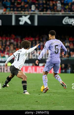 Peter Gonzalez of Valencia CF, Jude Bellingham of Real Madrid in action during the La Liga EA Sport Regular Season Round 27 on march 2, 2024 at Mestal Stock Photo