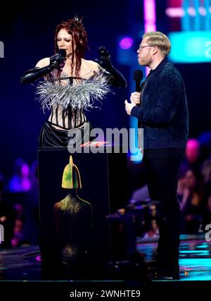 Bimini Bon Boulash and Rob Beckett on stage to present the award for International Song of the Year during the Brit Awards 2024 at the O2 Arena, London. Picture date: Saturday March 2, 2024. Stock Photo