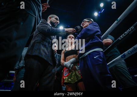 San Juan, Puerto Rico. 02nd Mar, 2024. Boxing: Featherweight, women, world championship fight, Serrano (Puerto Rico) - Meinke (Germany). Amanda Serrano (r) announces the cancellation of the fight next to Nina Meinke. Credit: Kendall Torres/dpa/Alamy Live News Stock Photo