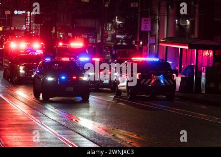 Seattle, USA. 2nd Mar 2024. Just after 11:00pm police rush to Union and Broadway on Capitol Hill after a report of three people shot outside a popular bowling alley. Three victims were located and rushed to Harborview. Credit: James Anderson/Alamy Live News Stock Photo