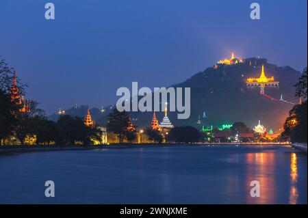 Night view of Mandalay palace and Mandalay Hill in Myanmar Burma Stock Photo