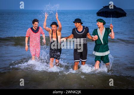 Heringsdorf, Germany. 02nd Mar, 2024. Actors Oliver Mommsen (l), Roman Knizka (2nd from left), Bernhard Bettermann (2nd from right) and Hendrik Duryn (r) take a dip in the water of the Baltic Sea in historical costumes after the 'Baltic Lights' sled dog race. To collect donations for Welthungerhilfe, professionals and celebrities compete against each other in teams of 500 huskies on the beach. Around 60,000 spectators are expected to attend the multi-day charity event at the weekend. Credit: Jens Büttner/dpa/Alamy Live News Stock Photo