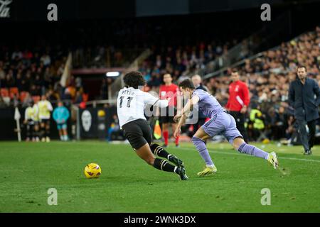 Valencia, Spain. 02nd Mar, 2024. Peter Gonzalez of Valencia CF, and Fran Garcia of Real Madrid seen in action during the La Liga EA Sport Regular Season Round 27 at Mestalla Stadium. Final scores; Valencia CF 2-2 Real Madrid. Credit: SOPA Images Limited/Alamy Live News Stock Photo