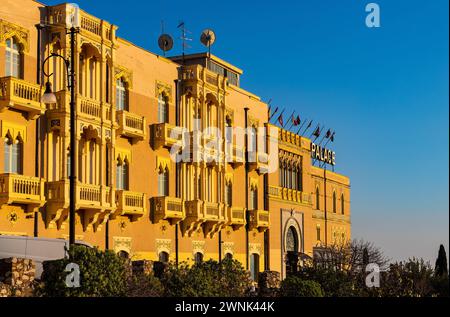 Taormina, Sicily, Italy - February 15, 2023: Excelsior Palace Four Seasons Palazzo Hotel on Taormina shore over Ionian sea in Messina region of Sicily Stock Photo