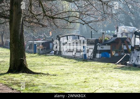 Windsor, Berkshire, UK. 3rd March, 2024. Barges on the River Thames. After a foggy start to the morning, the mist and fog quickly disappeared to leave a  beautiful bright and sunny morning in Windsor, Berkshire. Credit: Maureen McLean/Alamy Live News Stock Photo