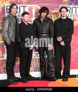 London, UK. Mat Nicholls, Oliver Sykes, Lee Malia and Matt Kean of Bring Me The Horizon photographed attending the BRITS Awards at the O2 Arena on 2 March 2024 . Picture by Julie Edwards/Alamy Live News Stock Photo