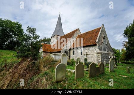 View of Berwick Church (St Michael & All Angels Church) and churchyard, Berwick, Polegate, East Sussex, England, decorated by Bloomsbury Group artists Stock Photo