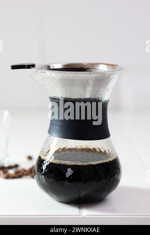 V60 Pour Over Manual Coffee Maker on White Table Stock Photo